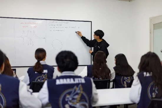 Revision class with tutor at the board